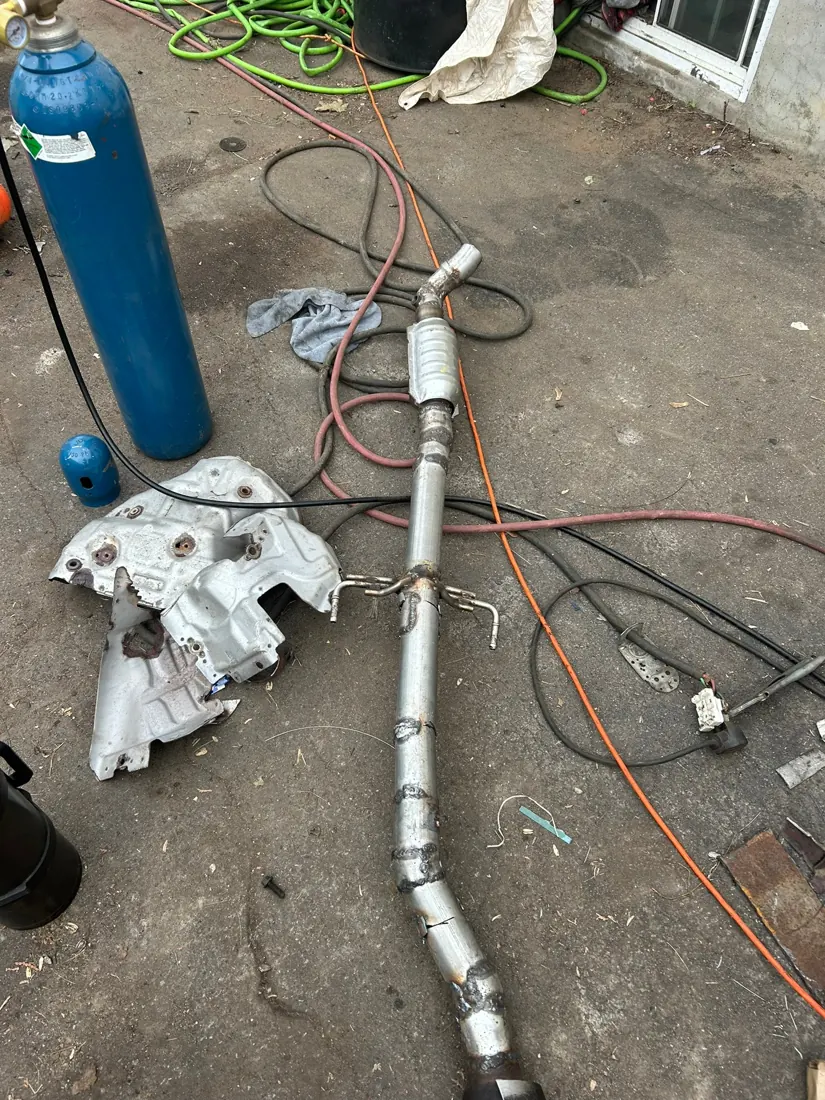 Long exhaust assembly with welded sections